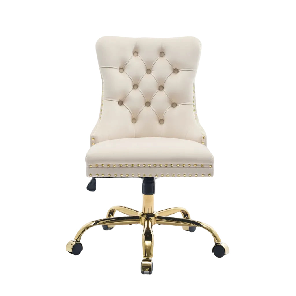 side view of beige velvet desk chair featuring gold tone metal support base