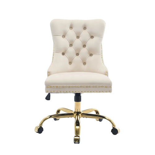 side view of beige velvet desk chair featuring gold tone metal support base