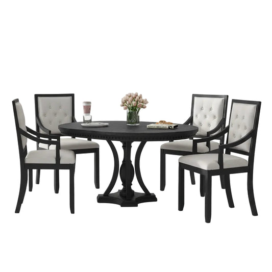 black and oak round dining table set with four matching chairs arranged in dining room interior