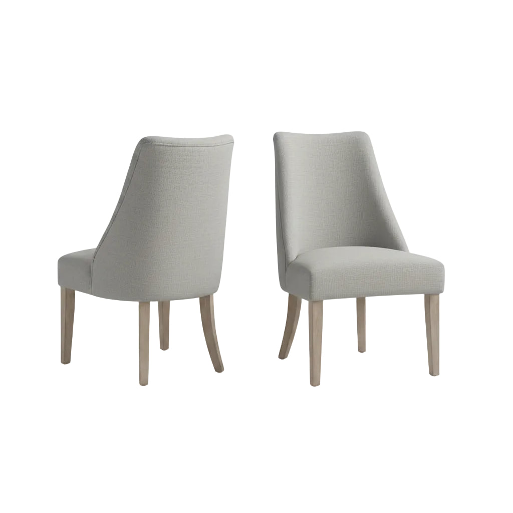 light grey upholstered dining chair set with reclaimed wood legs positioned beside dining table