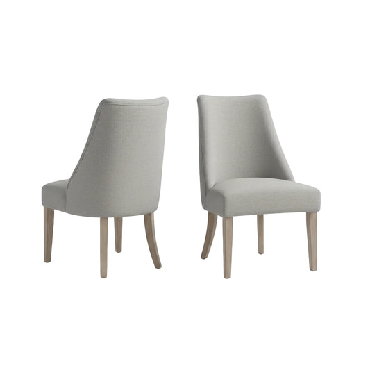 light grey upholstered dining chair set with reclaimed wood legs positioned beside dining table