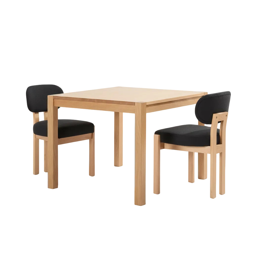 modern black upholstered chair with rubberwood support legs and fabric seating surface