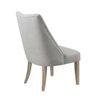 two piece upholstered dining chair set arranged in modern dining room environment