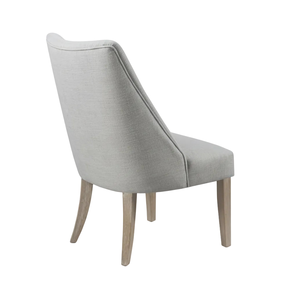two piece upholstered dining chair set arranged in modern dining room environment