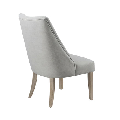 two piece upholstered dining chair set arranged in modern dining room environment